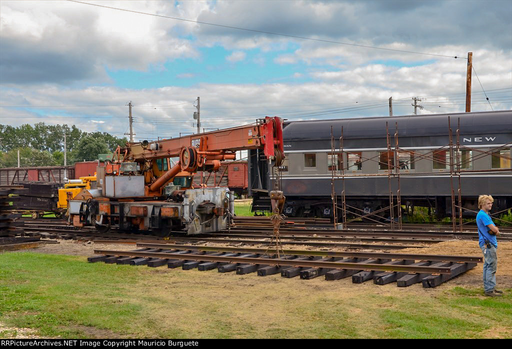 Amtrak Burro Crane Model 50 laying track